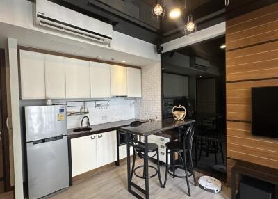 Modern kitchen with breakfast bar and appliances