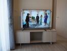 Living room with television and wooden cabinet