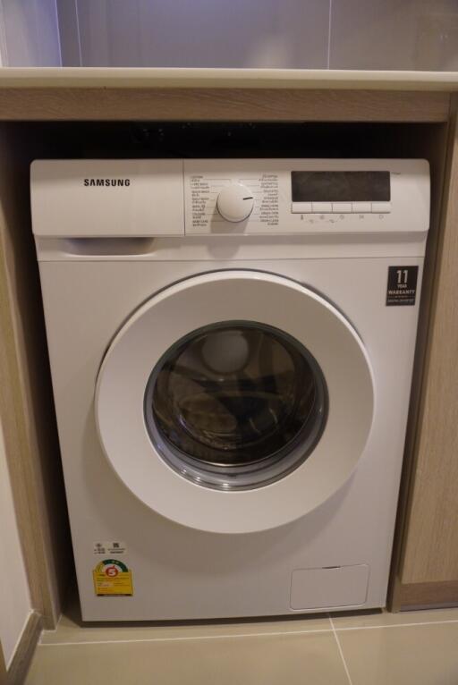 Laundry area with washing machine