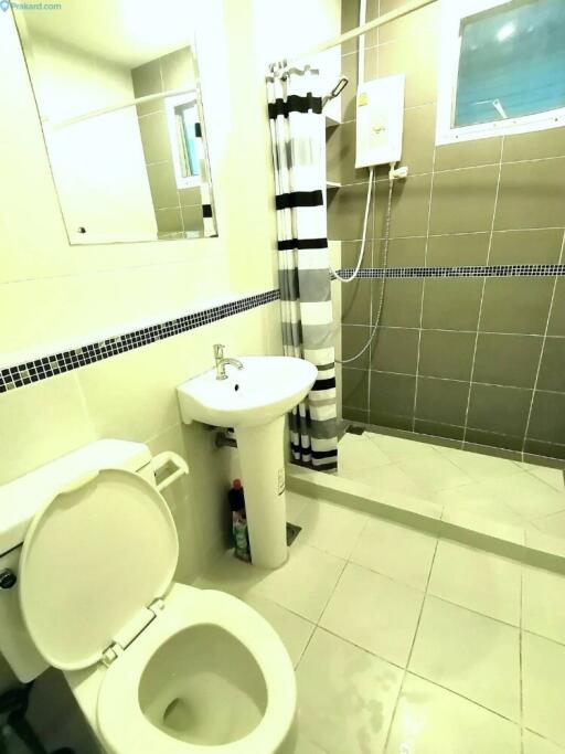 Modern bathroom with shower and toilet