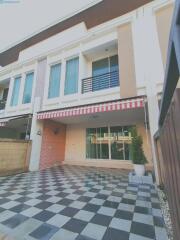 Front view of the house with driveway