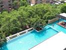 Aerial view of a swimming pool area in an apartment complex