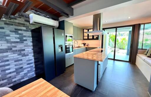 Modern kitchen with island and outdoor view