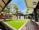 Outdoor patio with artificial grass and seating area