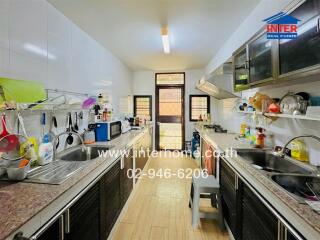 Modern kitchen with appliances and ample storage