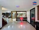 Modern kitchen and dining area with staircase