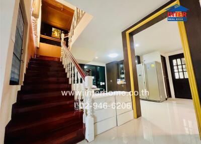 Staircase and kitchen area in a residential property