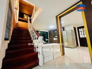 Staircase and kitchen area in a residential property