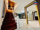 Staircase and kitchen area in a residential property