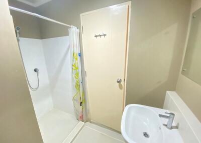 Bathroom with shower and sink