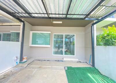 Covered patio with sliding glass doors