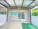 Covered patio with sliding glass doors