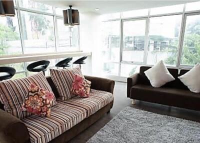 Bright and modern living room with large windows