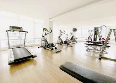 Modern gym with various exercise equipment