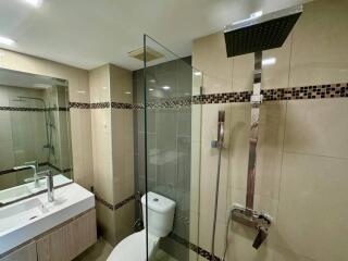 Modern bathroom with glass shower enclosure