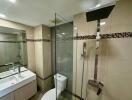 Modern bathroom with glass shower enclosure