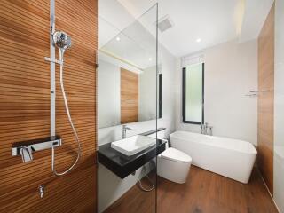 Modern bathroom with wooden elements and glass partition