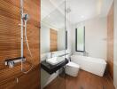 Modern bathroom with wooden elements and glass partition