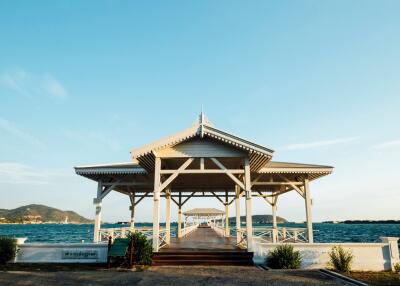 A beautiful pavilion overlooking the sea with a walkway