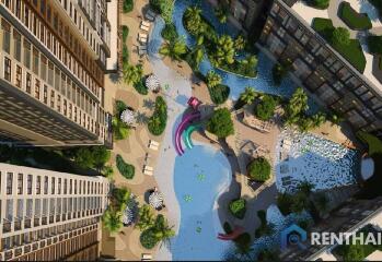 Top view of a residential complex with pool and greenery