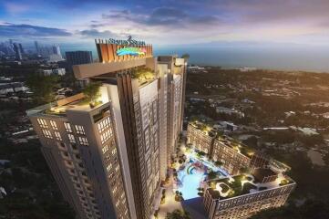 High-rise residential building with swimming pool and city view