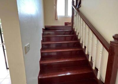 Wooden staircase with window