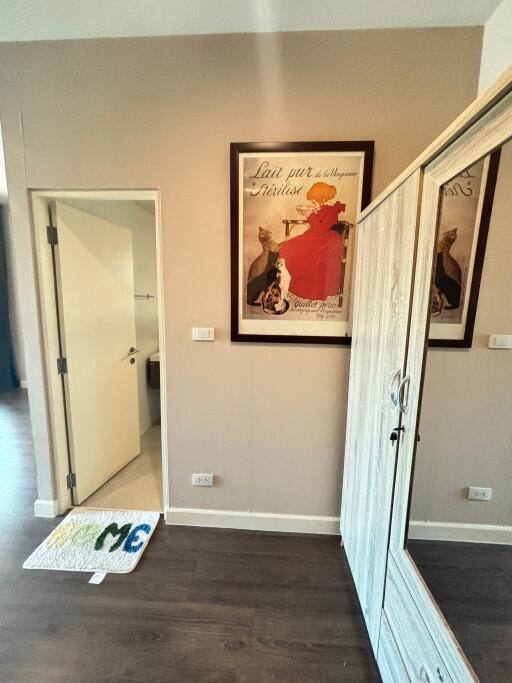 Bedroom with wall art and wardrobe