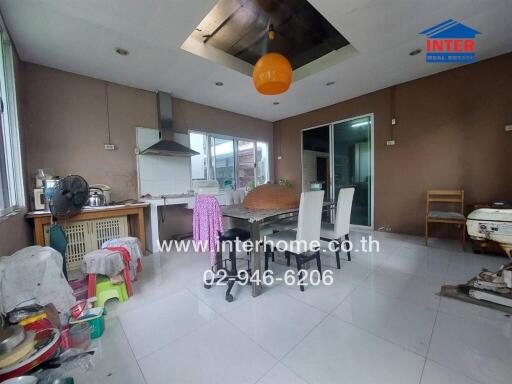 Spacious kitchen with dining area and modern amenities