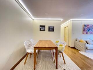 Dining area with wooden table and chairs