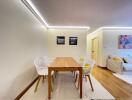 Dining area with wooden table and chairs