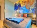 Bedroom with artistic wall mural