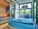 Modern bedroom with large windows and a nature view