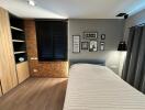 Modern Bedroom with Wooden Elements and Wall Art