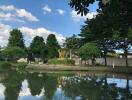 Manicured garden with pond and sculpture