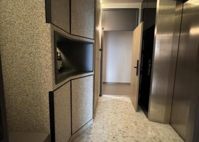 Hallway with elevator and modern interior