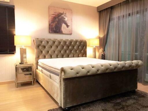 Spacious bedroom with a large bed and stylish decor