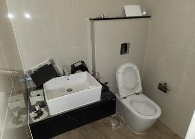 Bathroom with sink and toilet