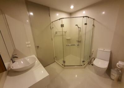 Modern bathroom with glass shower enclosure