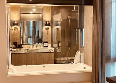 Modern bathroom with a large bathtub and stylish vanity area