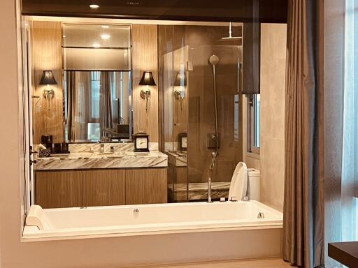 Modern bathroom with a large bathtub and stylish vanity area