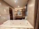 Modern and luxurious bathroom with a large marble jacuzzi tub and stylish fixtures