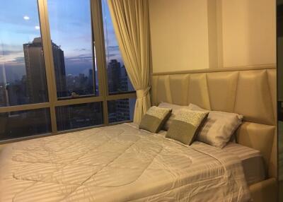 Modern bedroom with city view