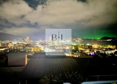 Cityscape view from balcony at night