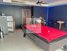 Entertainment room with a pool table