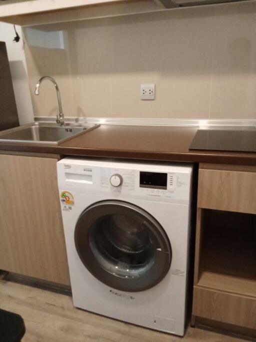 Modern kitchen with washing machine