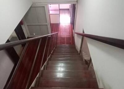 Wooden staircase leading to upper floor