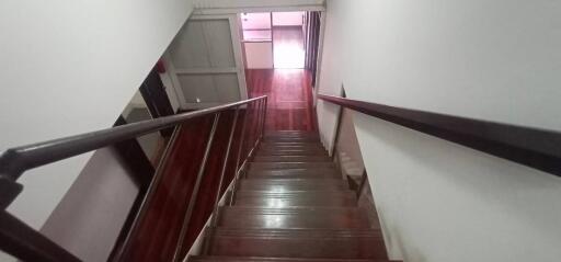 Wooden staircase leading to upper floor