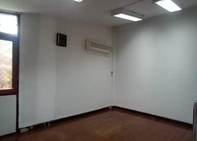 Empty room with window and air conditioner