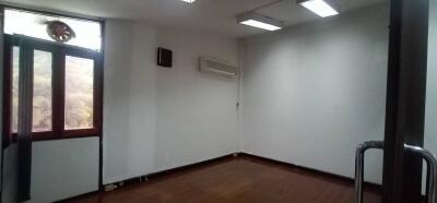 Empty room with window and air conditioner