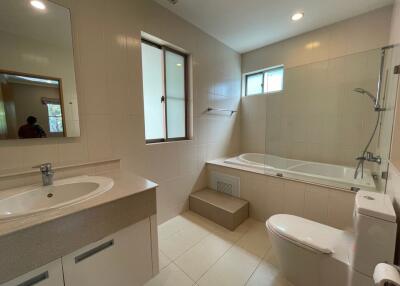 Modern bathroom with both a bathtub and a shower